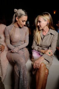 Kim Kardashian and Sarah Jessica Parker at the front row of the Fendi spring 2023 fashion show at the Hammerstein Ballroom on Sept. 9, 2022, in New York.